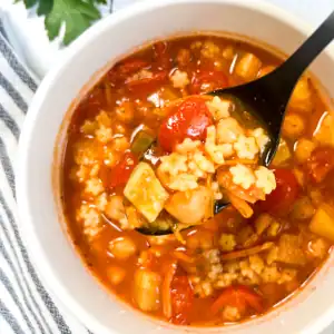 Easy vegan minestrone soup in a white bowl