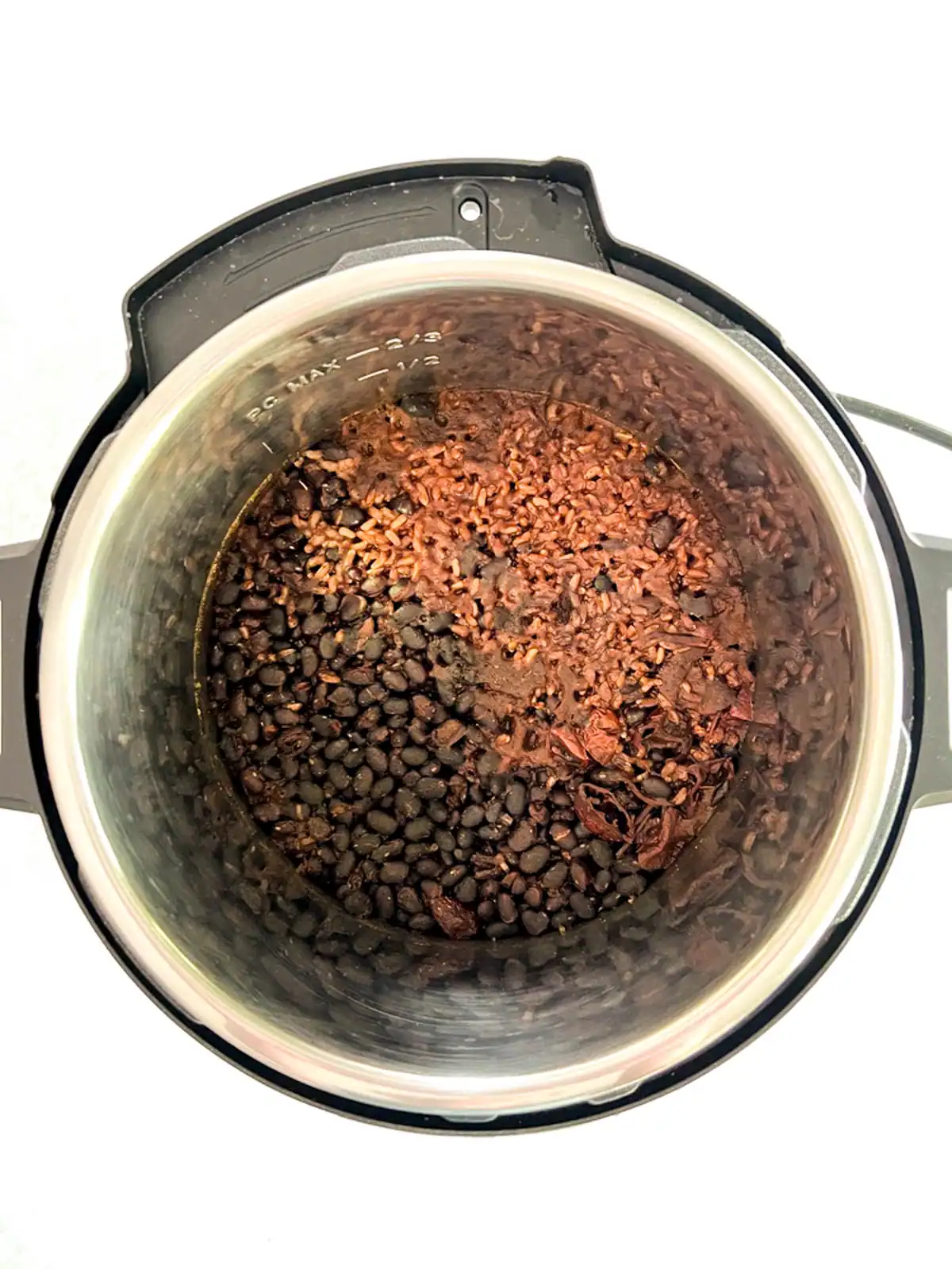 Cooked vegan black beans and rice in an Instant Pot.