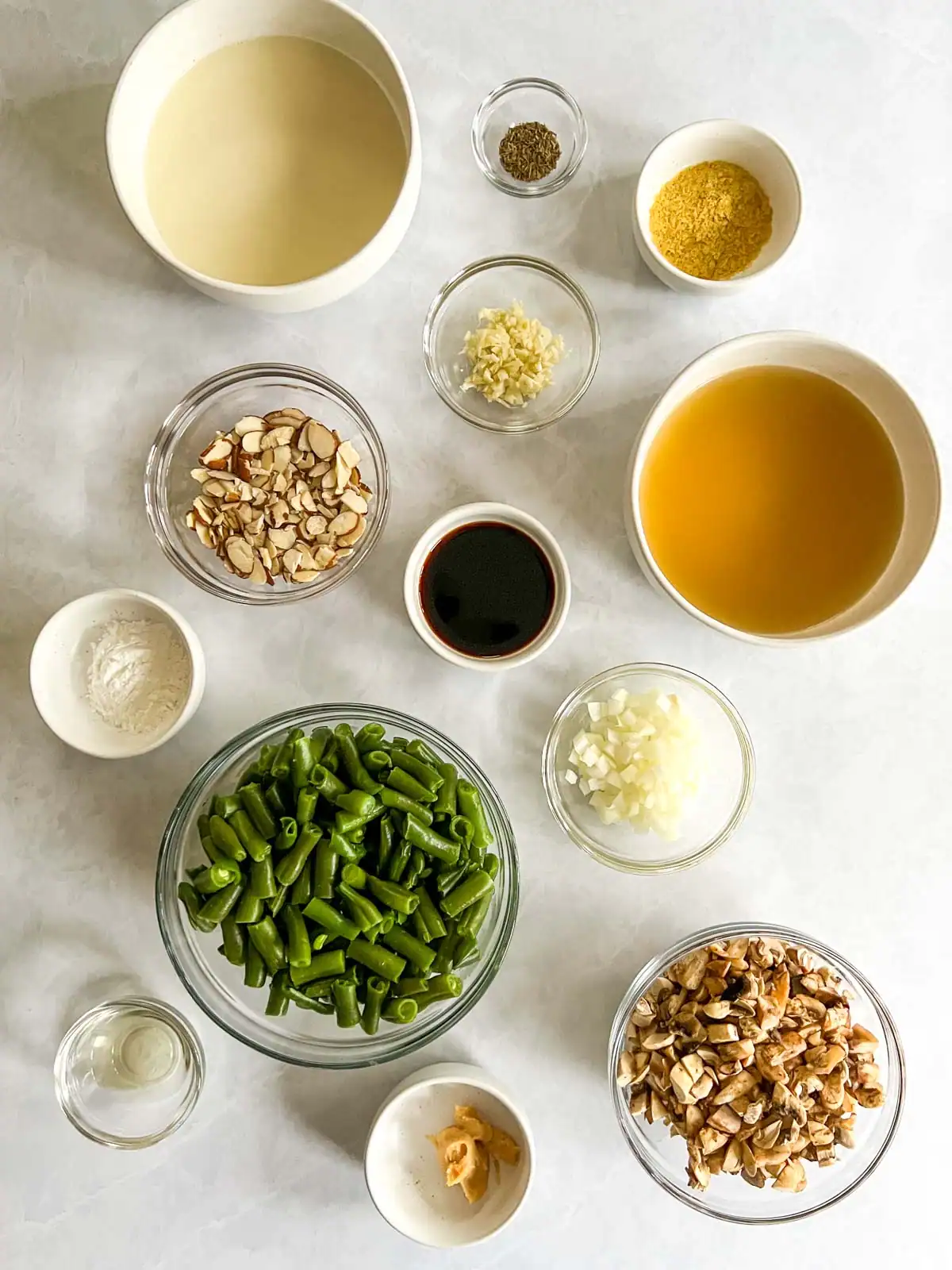 Fresh green beans, mushrooms, and other ingredients for vegan green bean casserole.