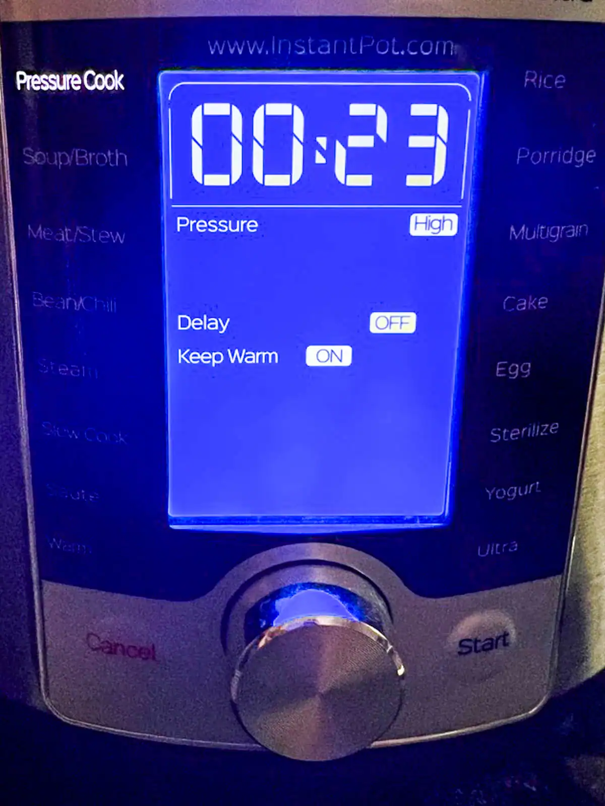 Electric display of Instant Pot set for 23 minutes at high pressure.