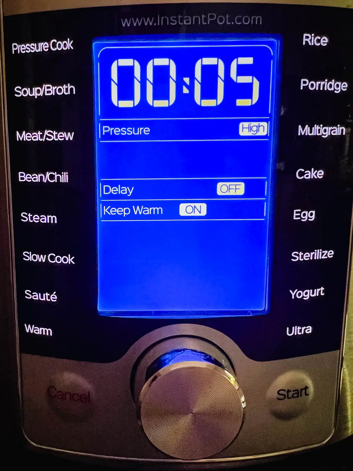 Display on Instant Pot set to Pressure Cook at High pressure for 5 minutes.