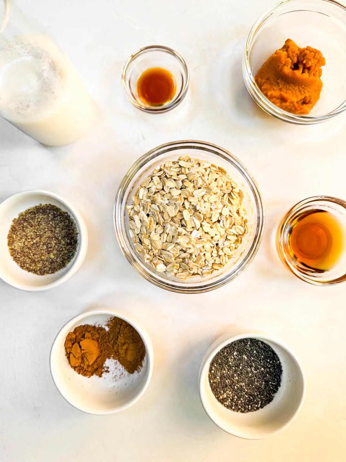 Ingredients for blended vegan pumpkin spice overnight oats.