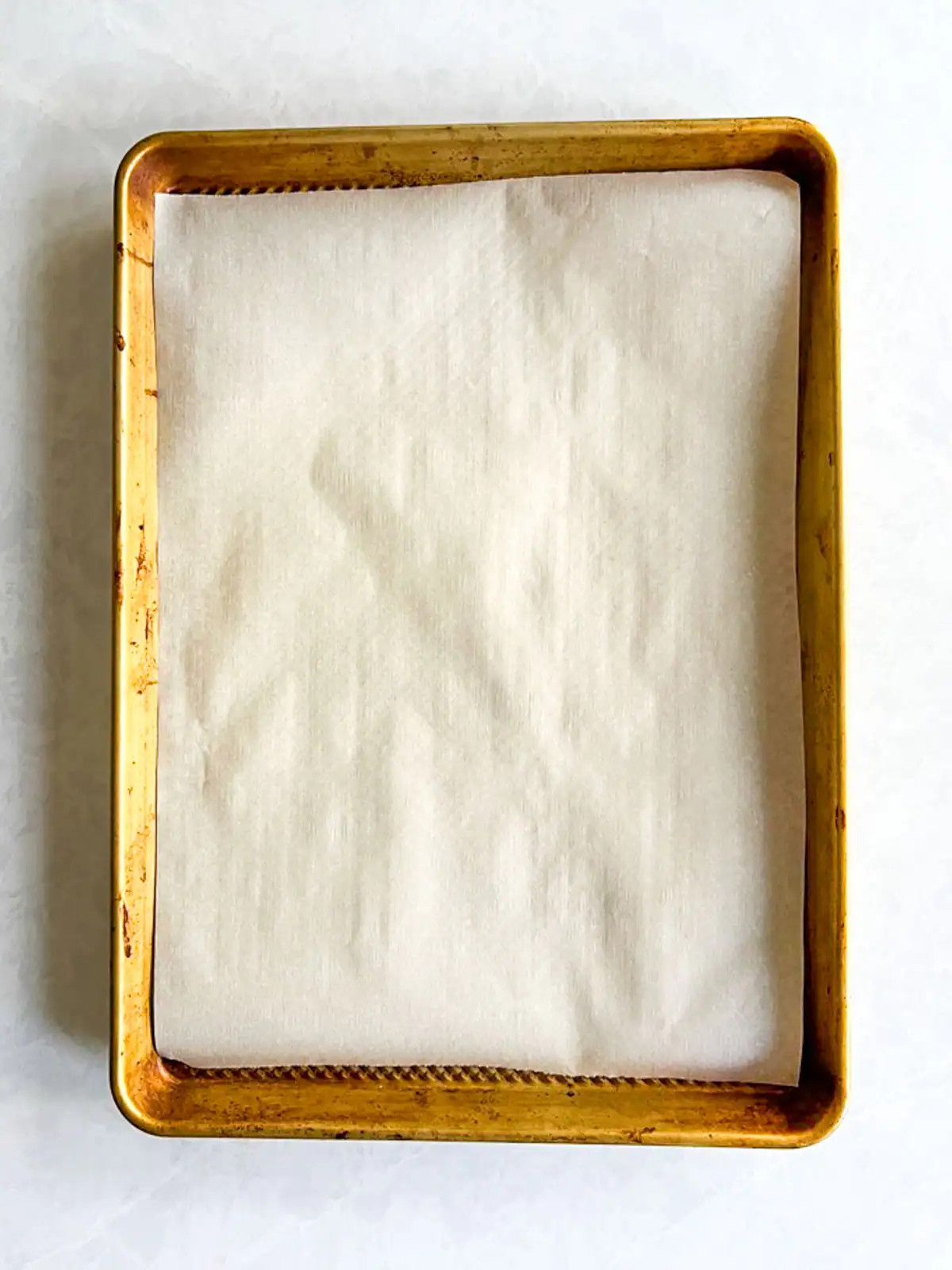 Baking sheet lined with parchment paper.