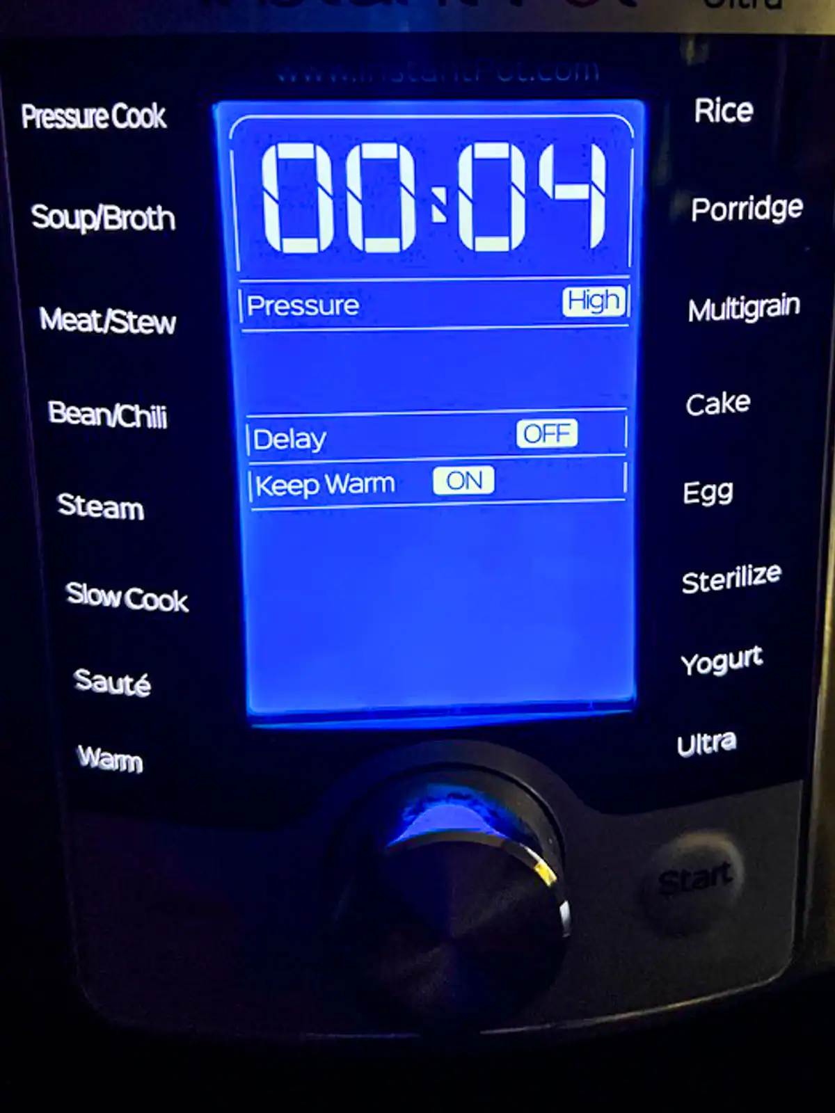 Display panel of an Instant Pot set to Pressure Cook on High for 4 minutes.