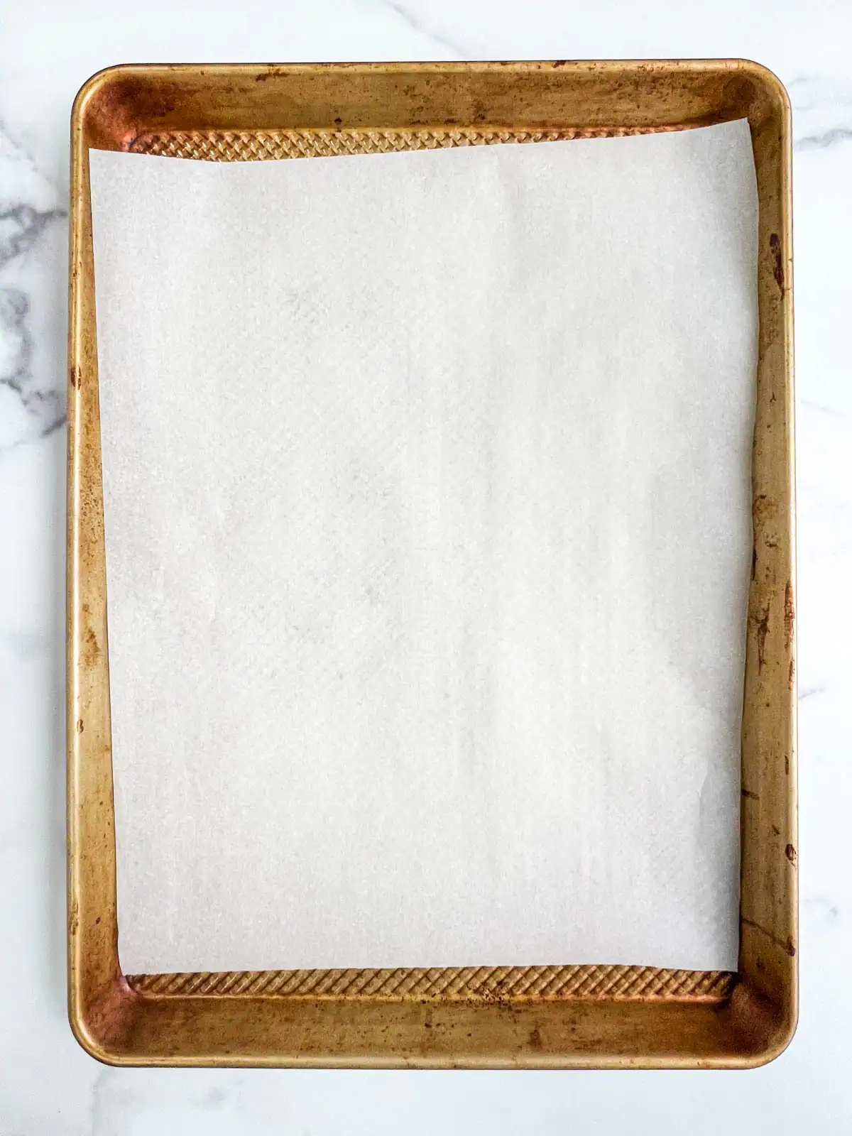 Baking sheet lined with parchment paper.