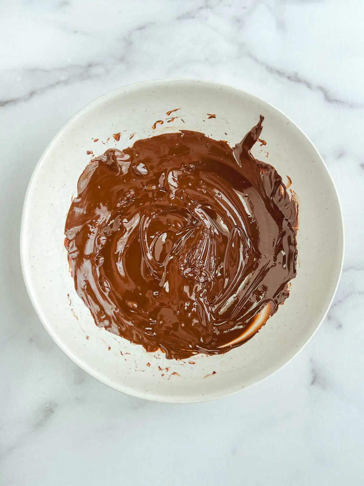 Melted chocolate in a bowl.