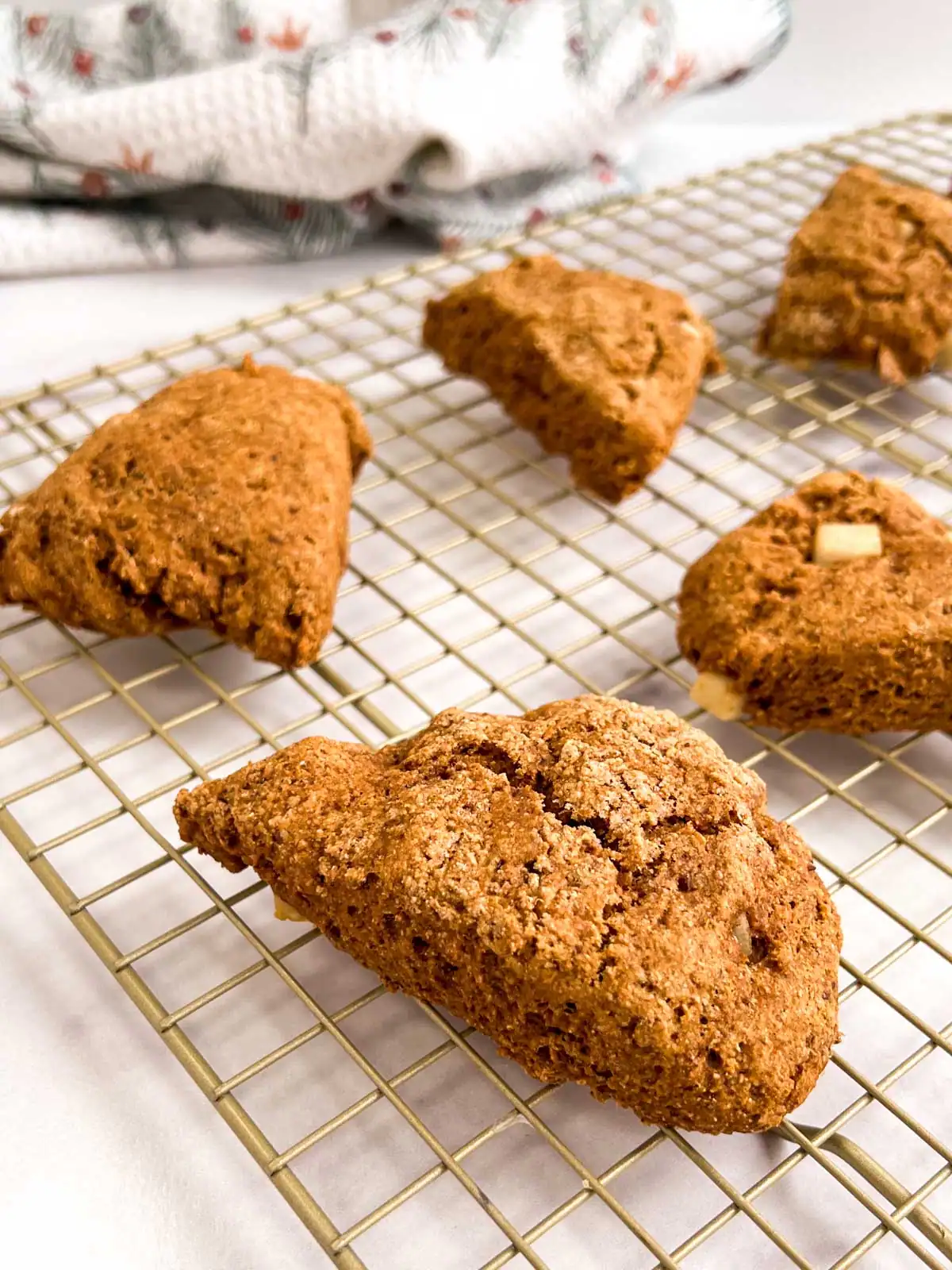 Vegan ginger pear scones on a cooling rack.