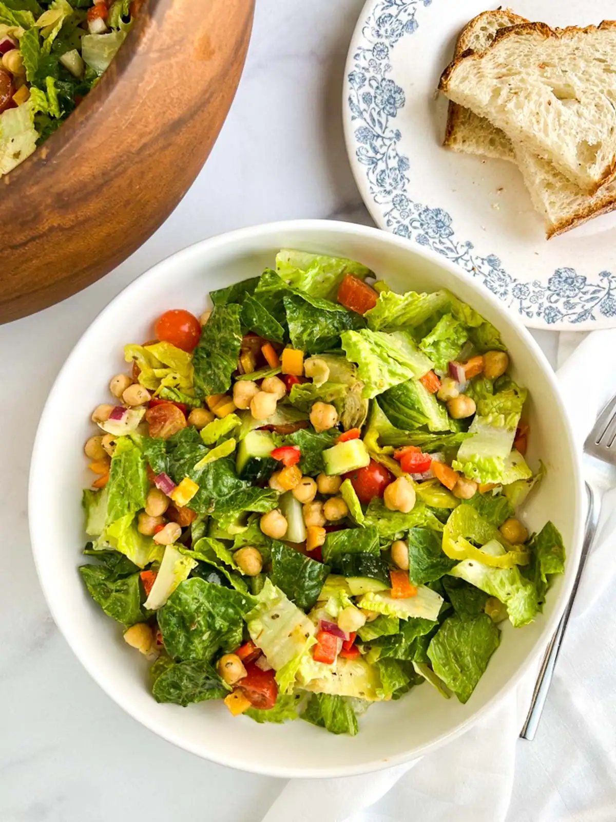 Vegan Italian chopped salad in a white bowl.