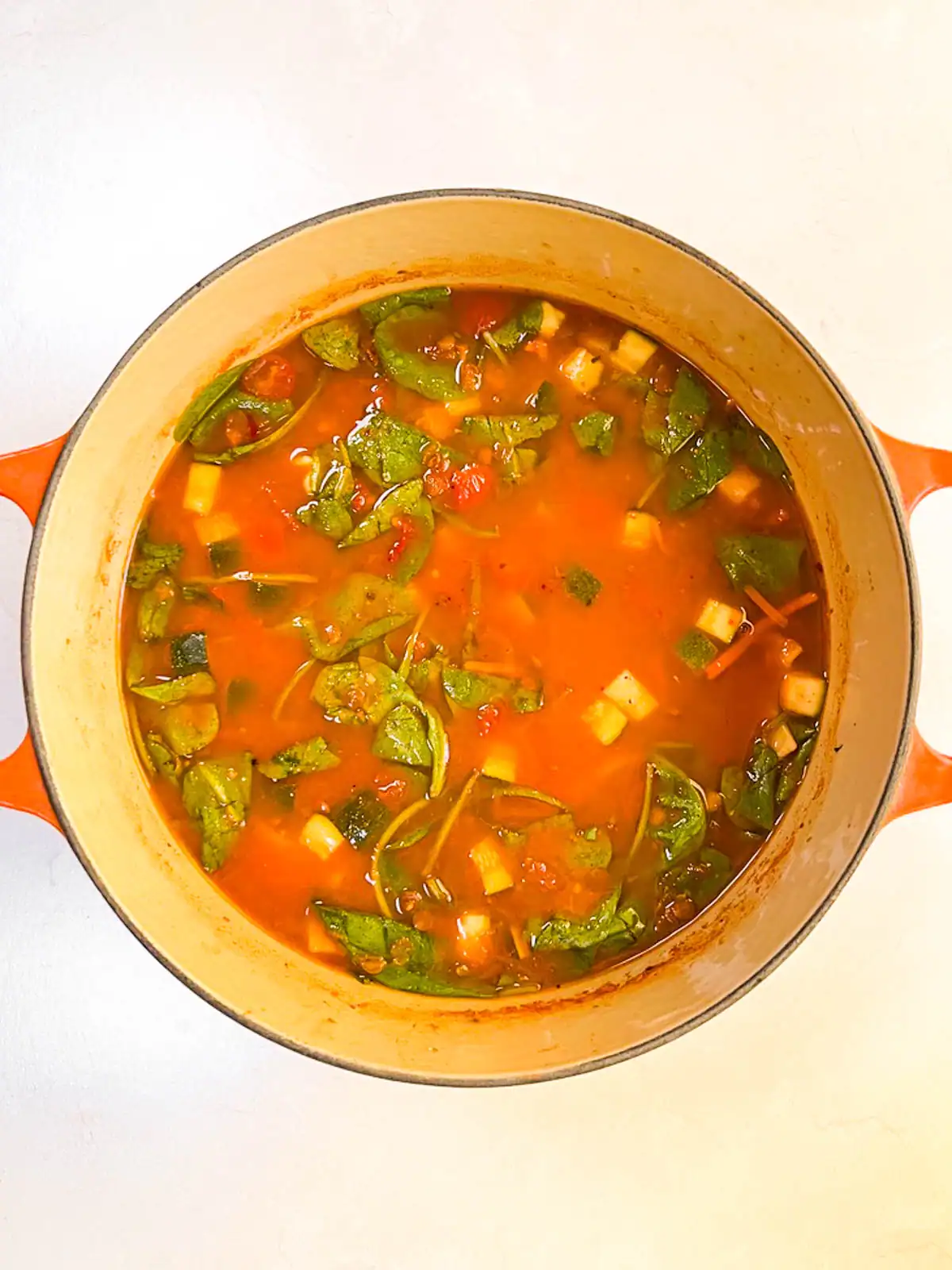Spicy vegan lasagna soup in a pot.