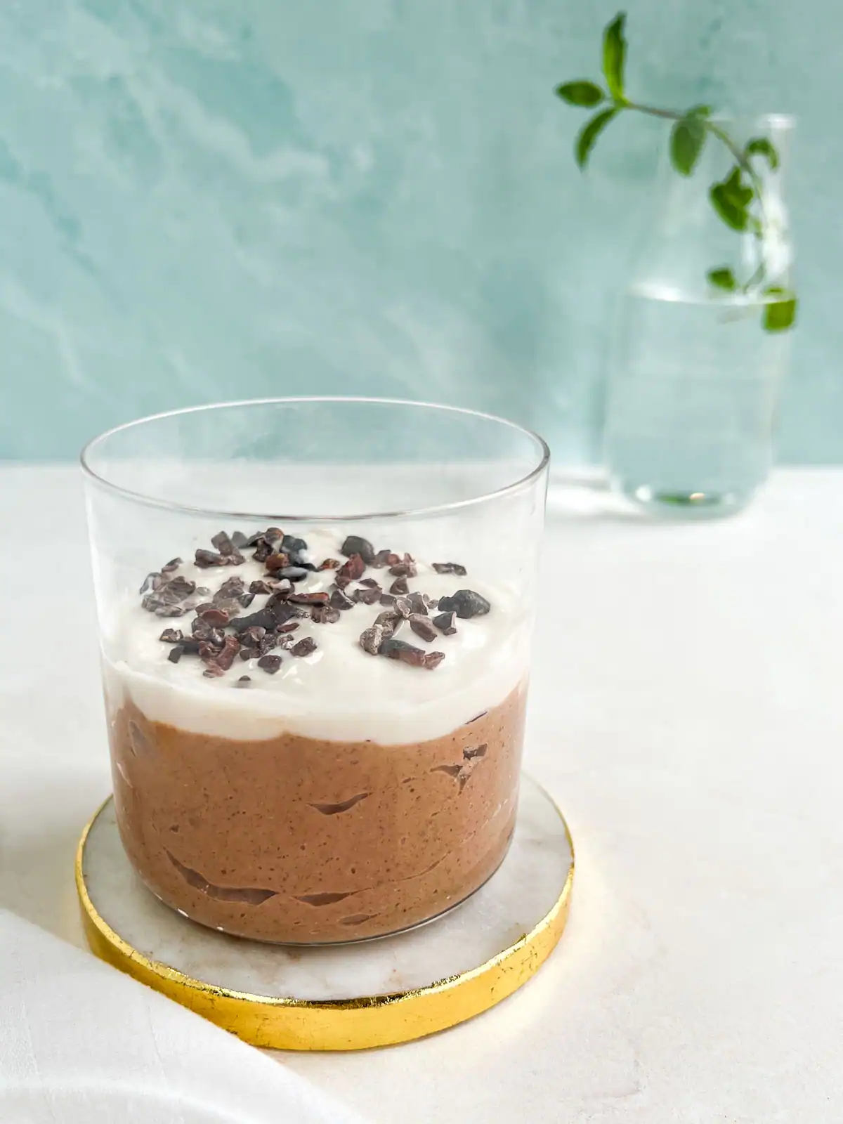 Mint chocolate blended overnight oats in a glass.