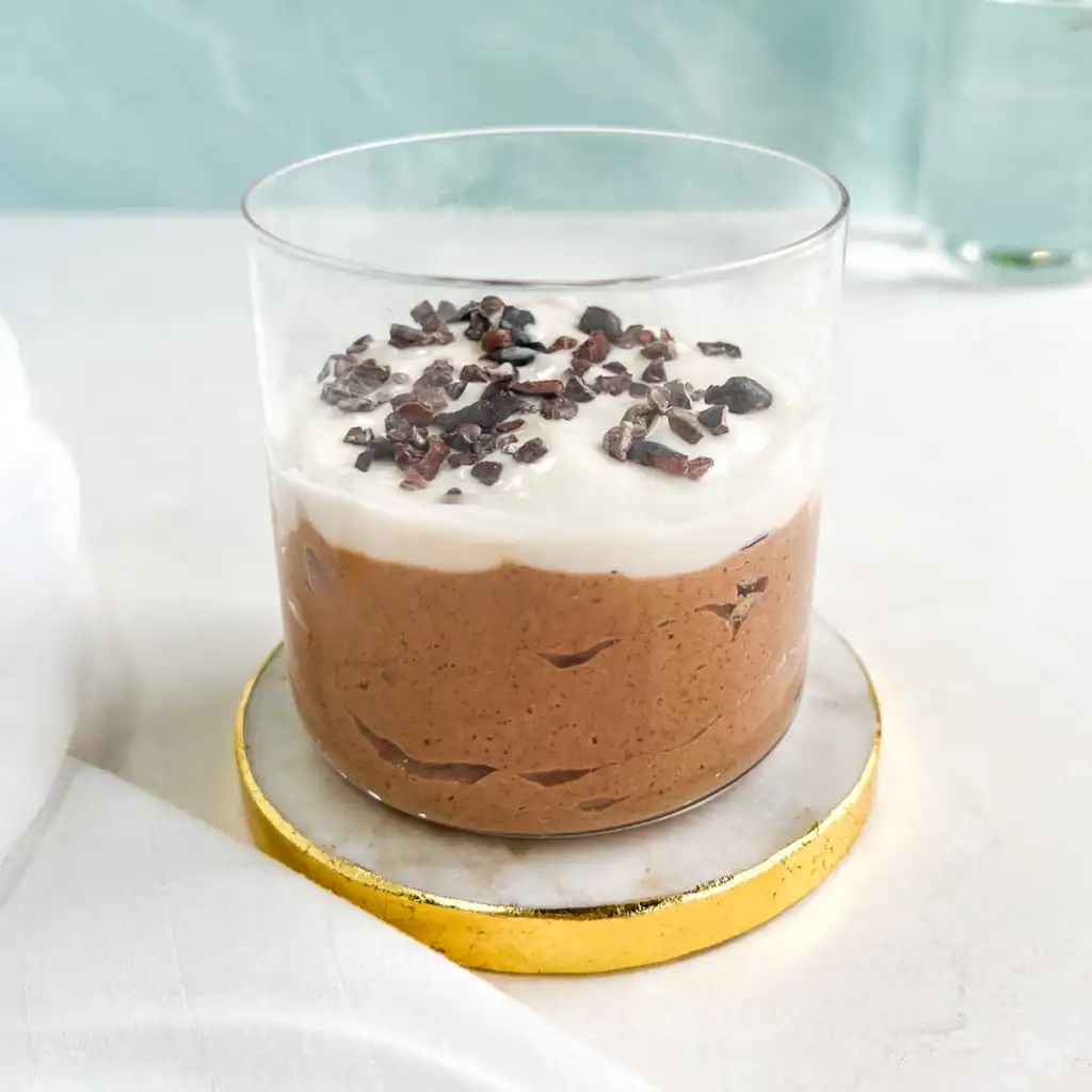Mint chocolate blended overnight oats in a glass.