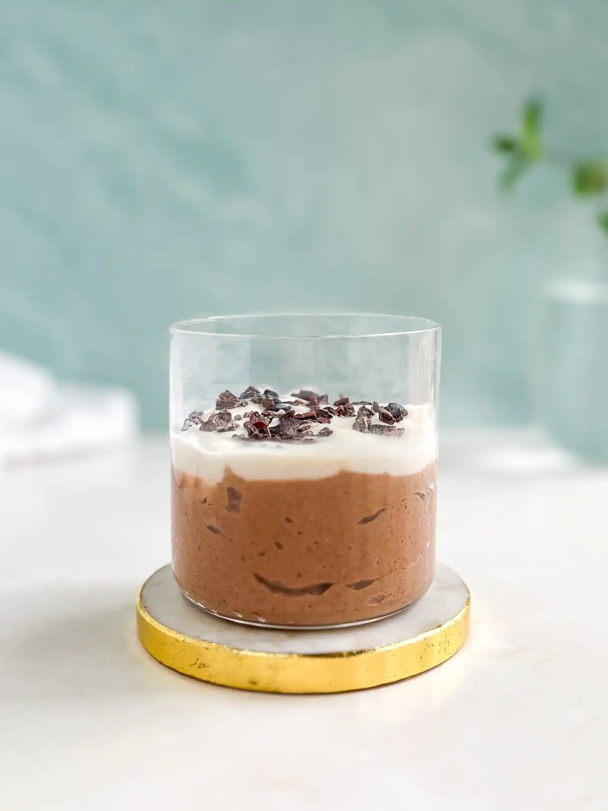 Mint chocolate blended overnight oats in a glass.