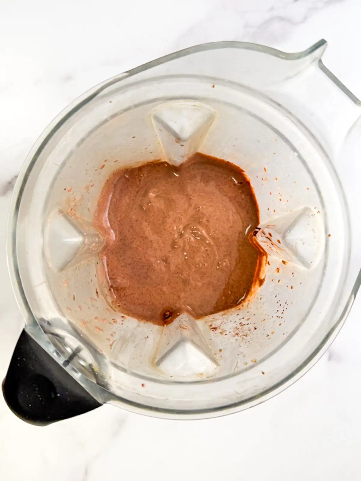 Vegan chocolate mousse in a blender.