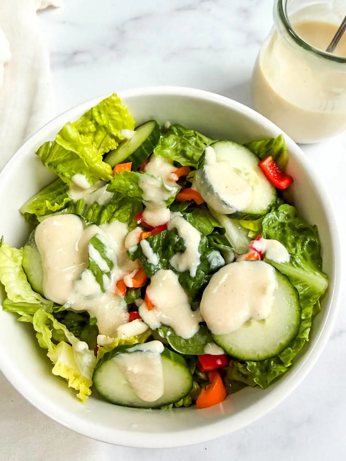 Vegan Caesar dressing on a salad.