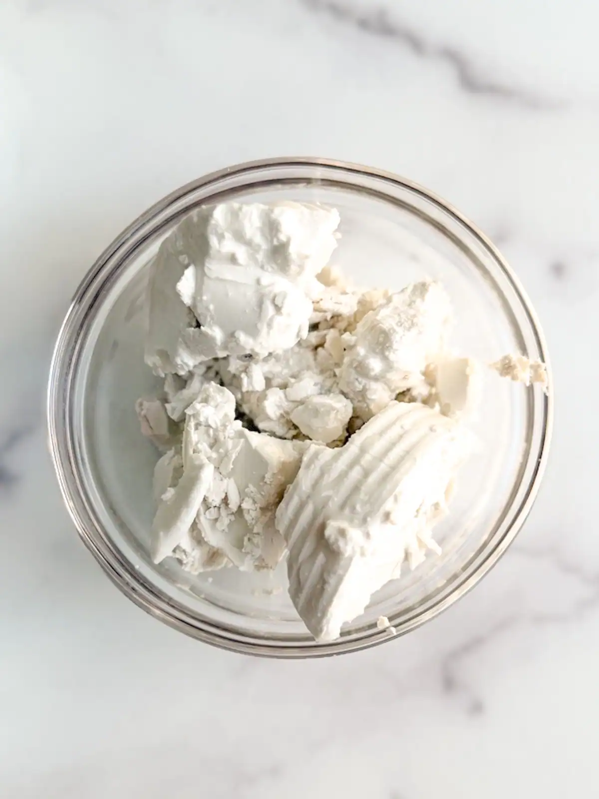 Chilled coconut milk in a glass bowl.