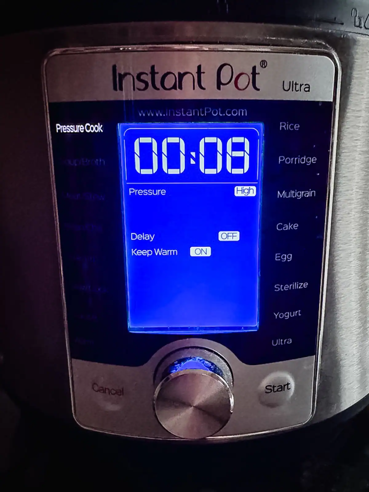 Instant Pot display screen set to pressure cook on high for 8 minutes.