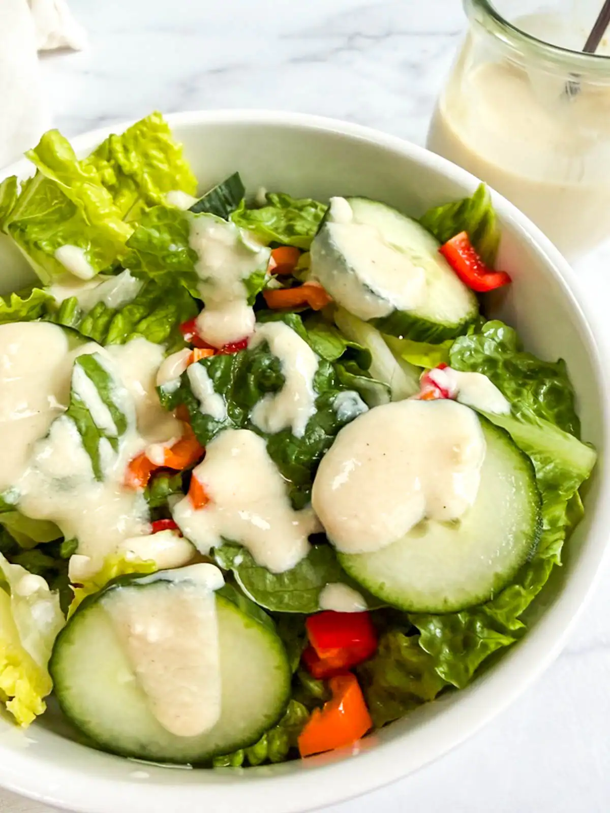 Vegan Caesar dressing on a salad.