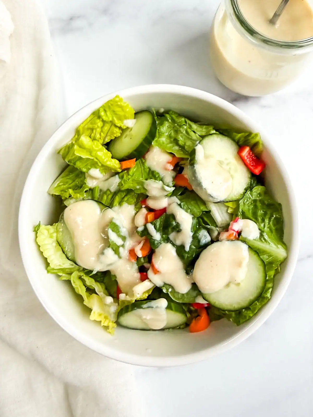 Vegan Caesar dressing on a salad.